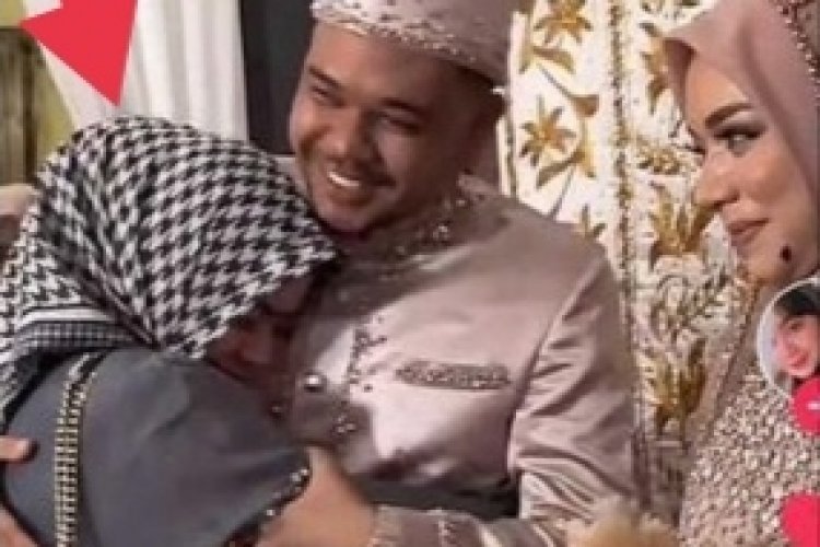 Viral Video Wanita Memeluk Pengantin Pria yang Bukan Pasangannya, Ternyata